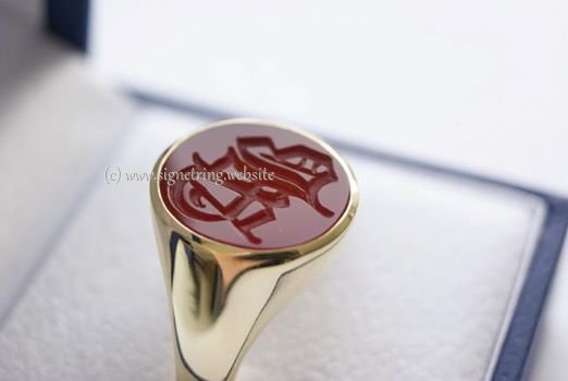 Gold ring with red carnelian