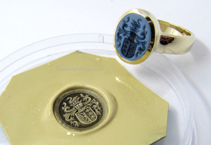 Signet ring with light blue layered agate