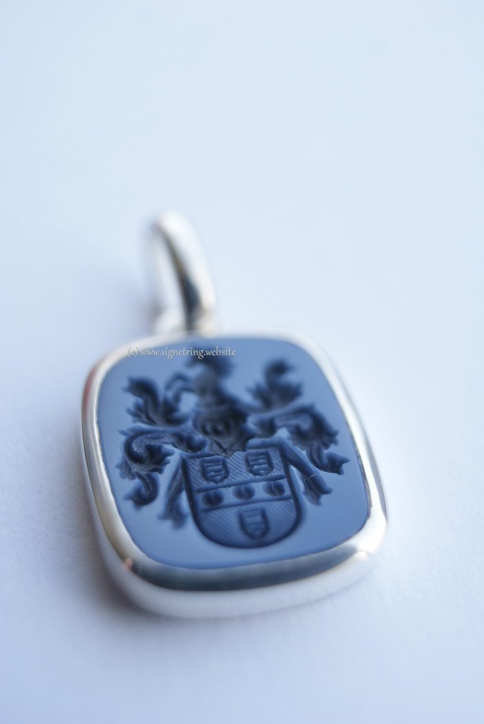 Silver hanger with coat of arms engraving